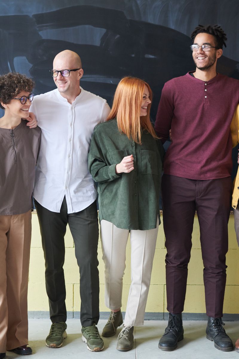 A friendly small business team posing together